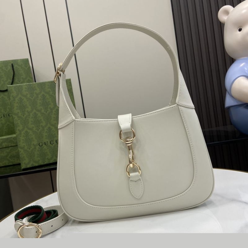 G*u*i top handle bags